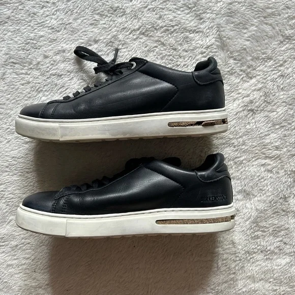 Birkenstock Black and White Sneakers with Minimalist Design - Picture 1 of 7